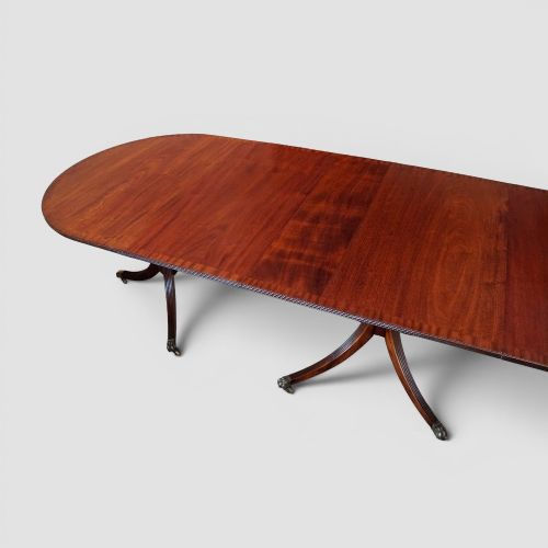 fig 1. Regency style mahogany three pillar dining table