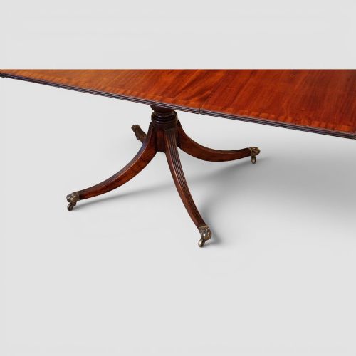 fig 5. Regency style mahogany three pillar dining table