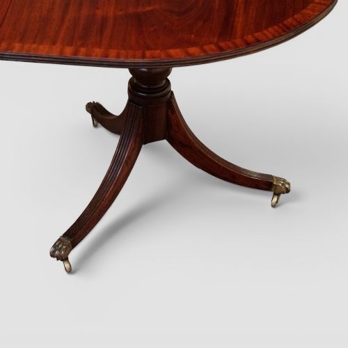fig 6. Regency style mahogany three pillar dining table