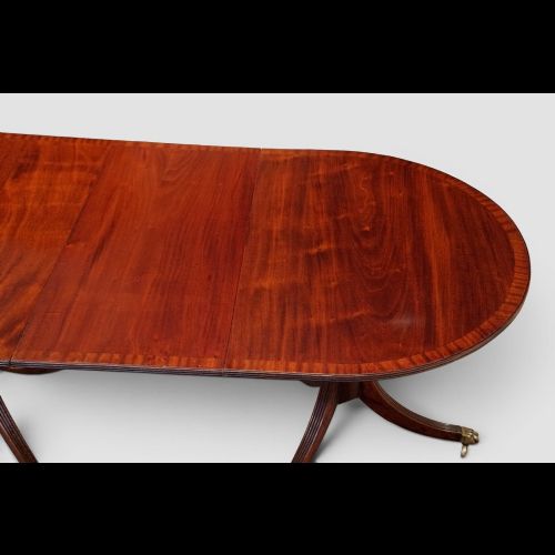 fig 7. Regency style mahogany three pillar dining table