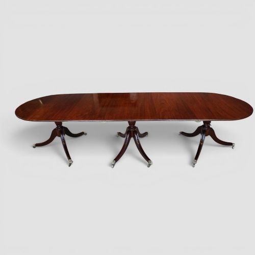 REGENCY STYLE MAHOGANY THREE PILLAR EXTENDING DINING TABLE CIRCA 1910 - ADDITIONAL PHOTO 1