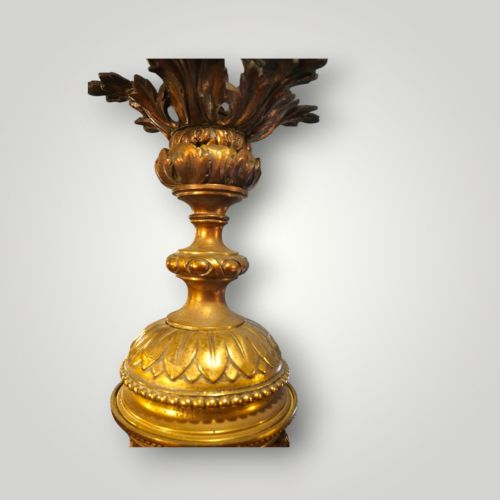 fig 5. A nineteenth-century gilt bronze hall lantern featuring a tapered glass vessel, acanthus leaf canopy, and decorative drapery swags.