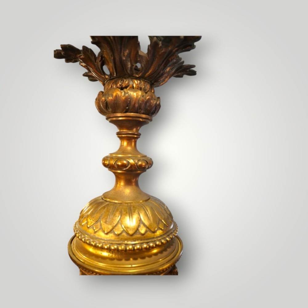 A nineteenth-century gilt bronze hall lantern featuring a tapered glass vessel, acanthus leaf canopy, and decorative drapery swags. View VI