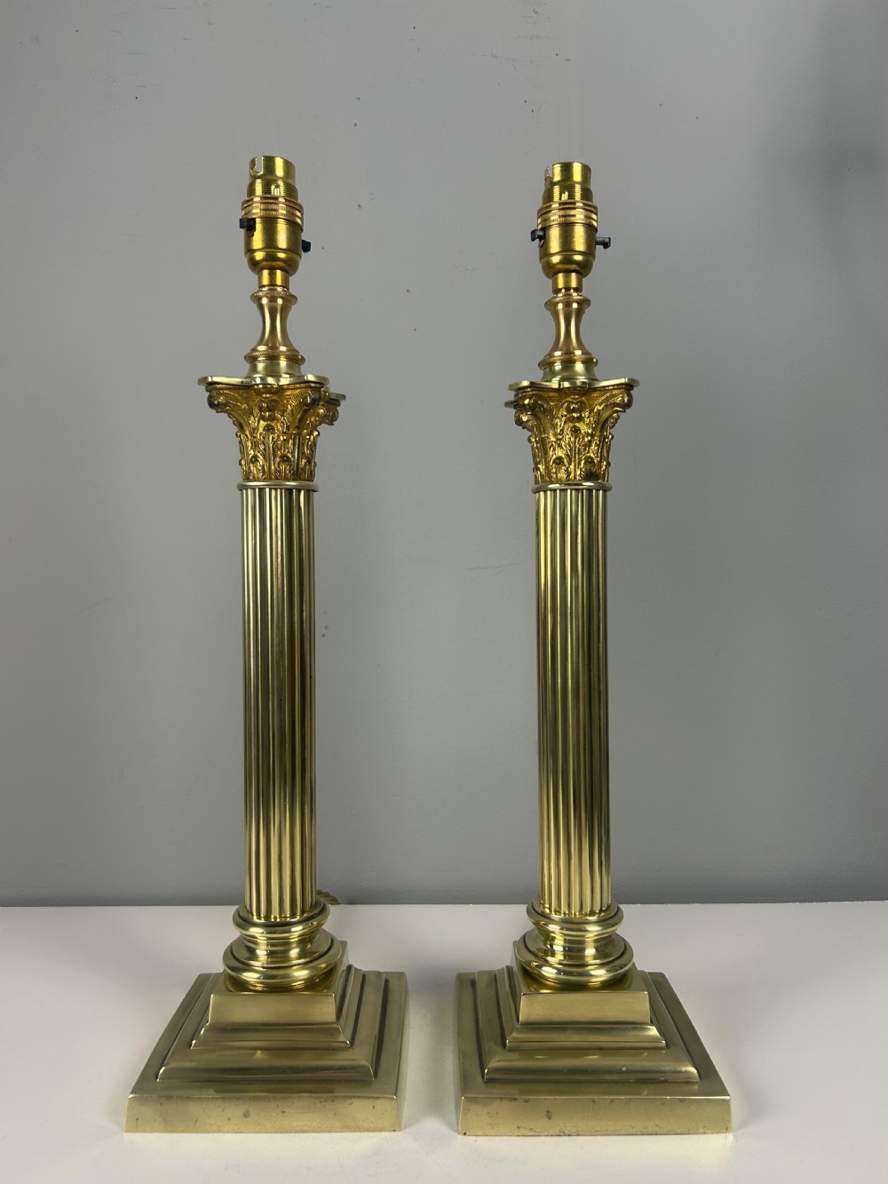 Pair of Hinks & Sons Brass Corinthian Column Table Lamps 