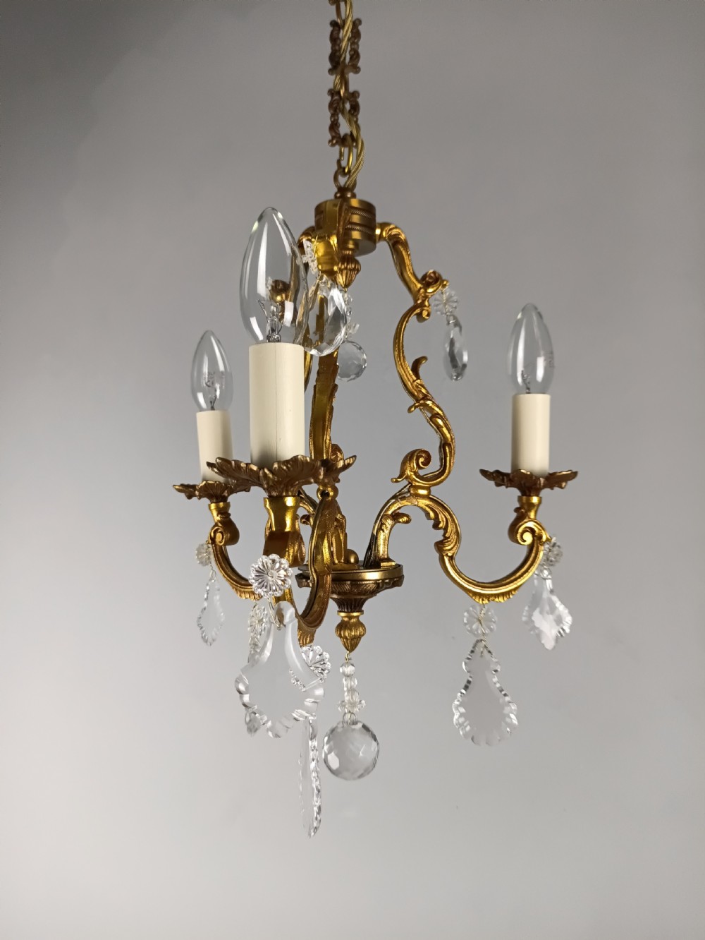 French Gilded Bronze Crystal Triple Light Antique Chandelier