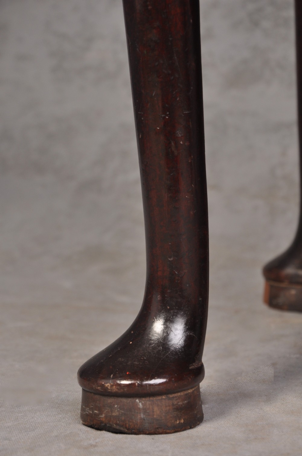 An 18th-century mahogany gateleg table featuring a drop-leaf top, hinged rounded leaves, and slender cabriole legs terminating in pad feet. View III