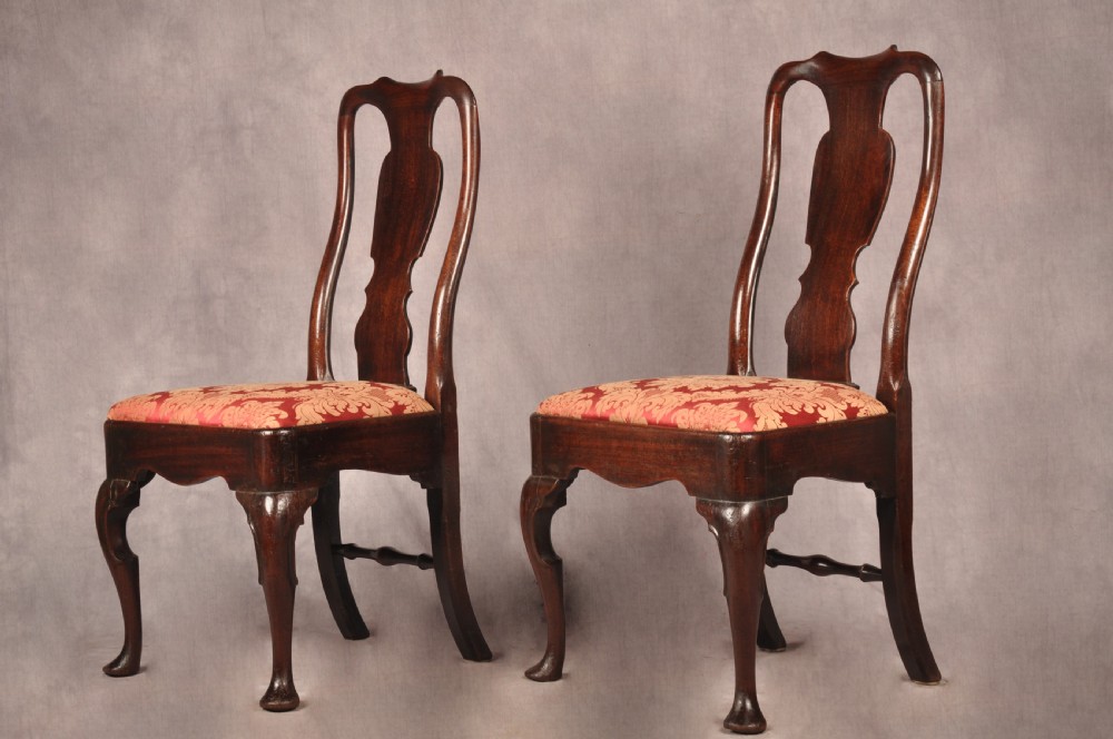 A Pair Of Early 18th Century Mahogany Chairs