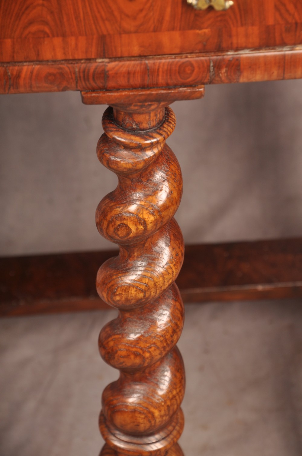 A seventeenth-century kingwood cabinet on stand featuring geometric oyster parquetry doors, a single frieze drawer, six barley twist legs, and a shaped stretcher. View XI