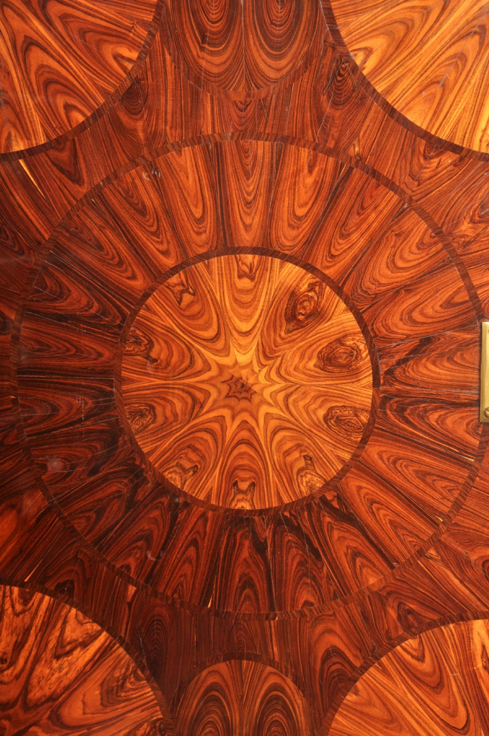 A seventeenth-century kingwood cabinet on stand featuring geometric oyster parquetry doors, a single frieze drawer, six barley twist legs, and a shaped stretcher. View XVII