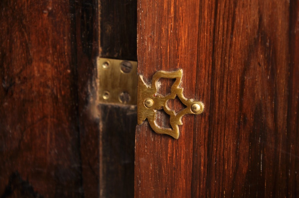 A seventeenth-century kingwood cabinet on stand featuring geometric oyster parquetry doors, a single frieze drawer, six barley twist legs, and a shaped stretcher. View XXII