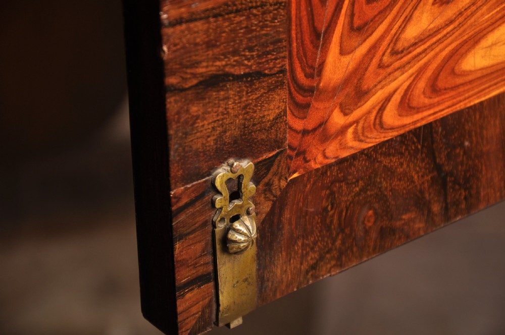 A seventeenth-century kingwood cabinet on stand featuring geometric oyster parquetry doors, a single frieze drawer, six barley twist legs, and a shaped stretcher. View XXIII