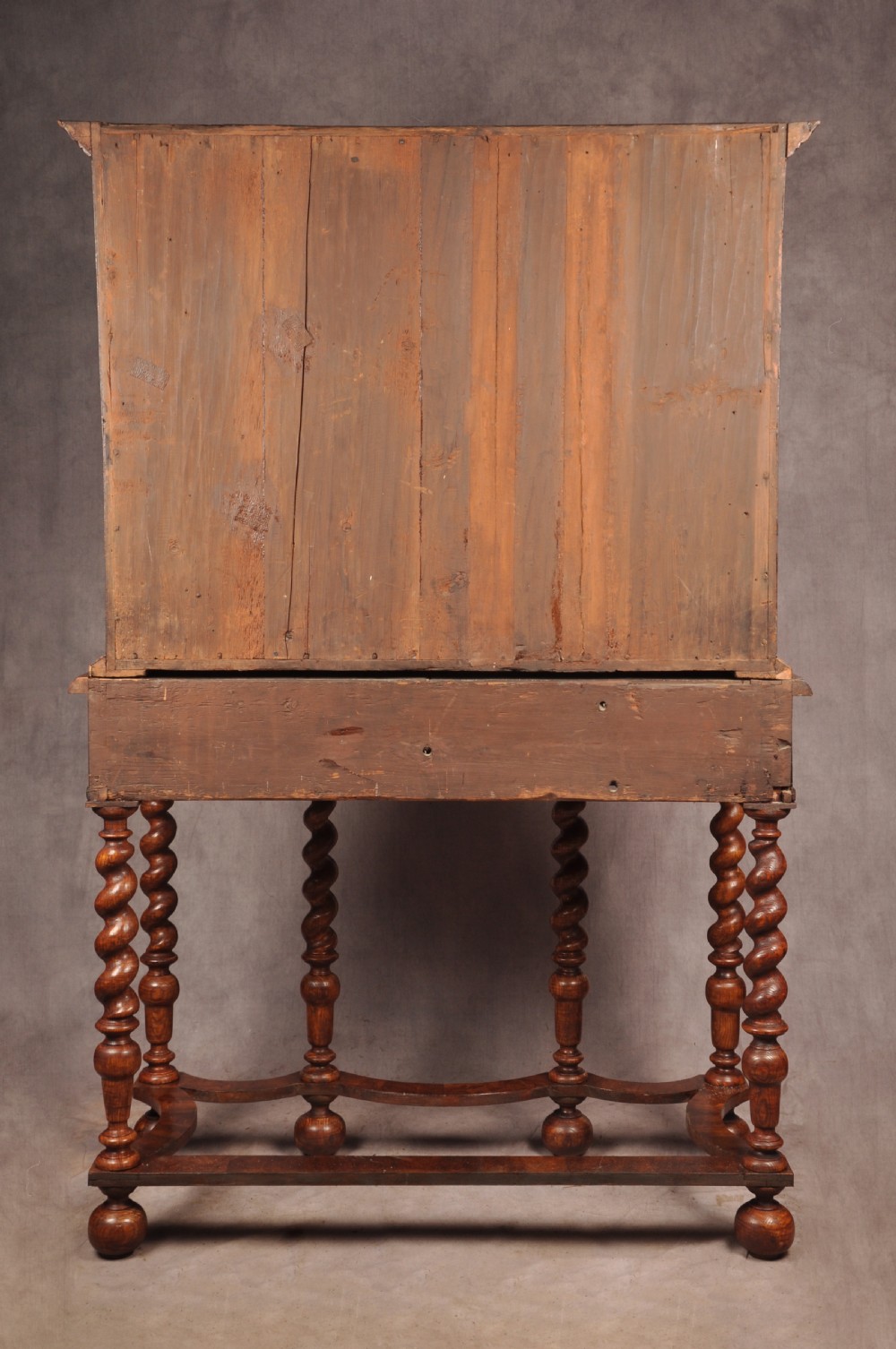 A seventeenth-century kingwood cabinet on stand featuring geometric oyster parquetry doors, a single frieze drawer, six barley twist legs, and a shaped stretcher. View XXIV