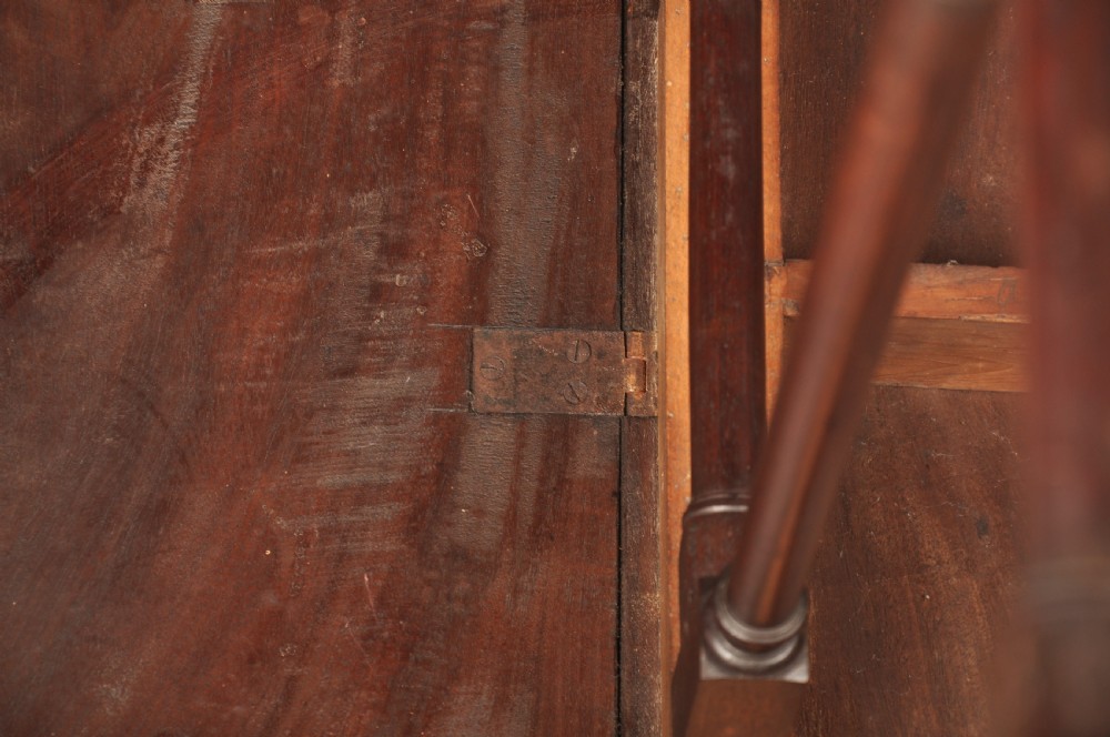 An 18th-century mahogany drop-leaf spider table featuring slender turned legs, cross stretchers, and two fold-out side flaps. View XIII