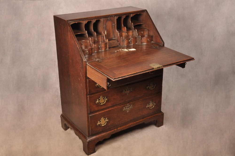 A Fine Early 18th Century Oak Bureau Of Small Proportions View II