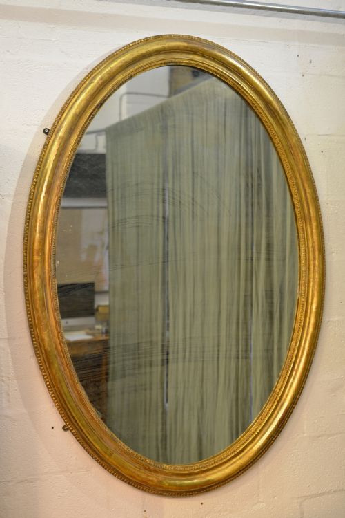 A VERY LARGE COUNTRY HOUSE OVAL GILT MIRROR C1880 - ADDITIONAL PHOTO 4