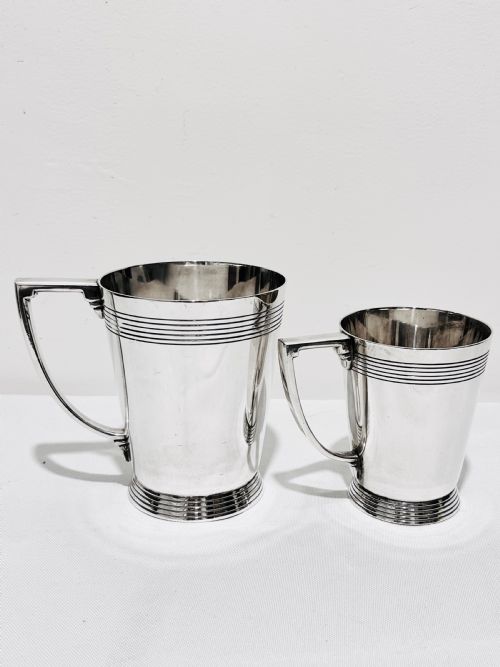 a handsome pair of tankards designed by keith murray for mappin webb c1930 - CATEGORY: ANTIQUE SILVER - DATED 1930