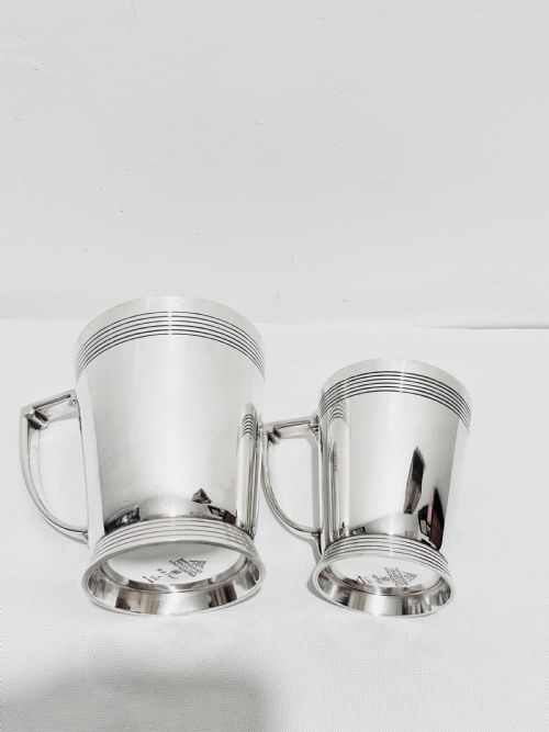 A HANDSOME PAIR OF TANKARDS DESIGNED BY KEITH MURRAY FOR MAPPIN WEBB C1930 - ADDITIONAL PHOTO 4