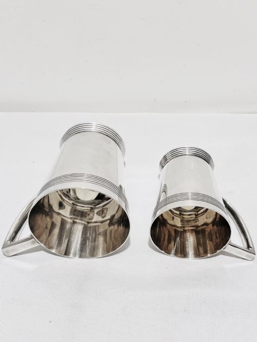 A HANDSOME PAIR OF TANKARDS DESIGNED BY KEITH MURRAY FOR MAPPIN WEBB C1930 - ADDITIONAL PHOTO 7