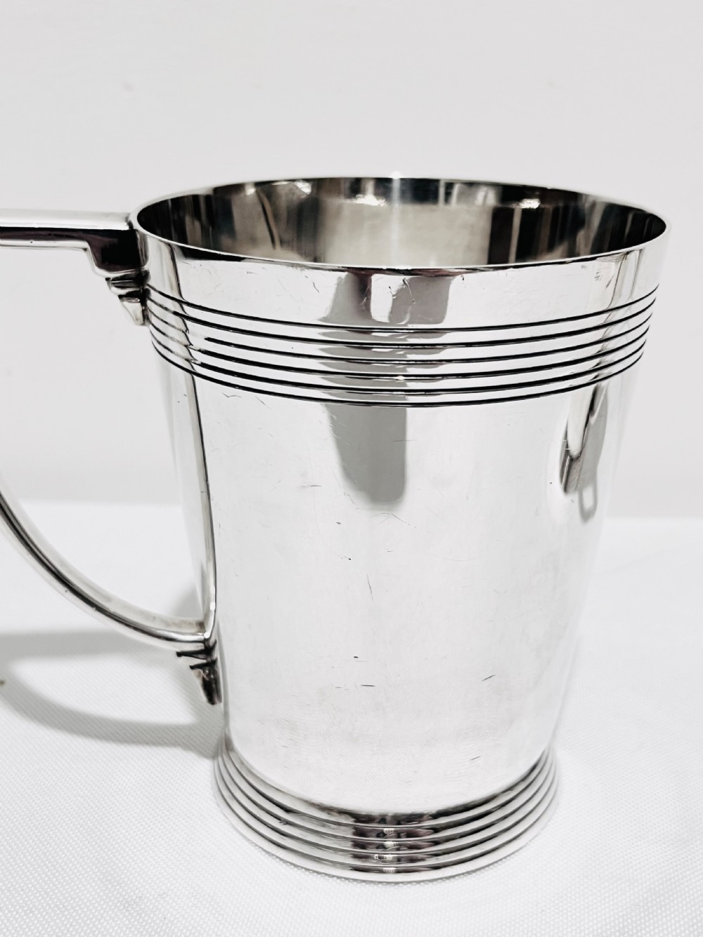 A handsome pair of tankards designed by Keith Murray for Mappin & Webb c1930 View II