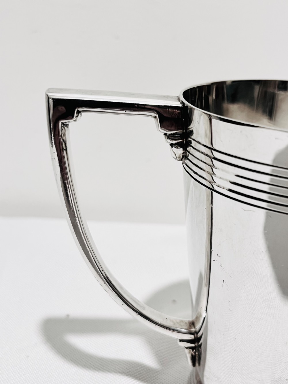 A handsome pair of tankards designed by Keith Murray for Mappin & Webb c1930 View IX