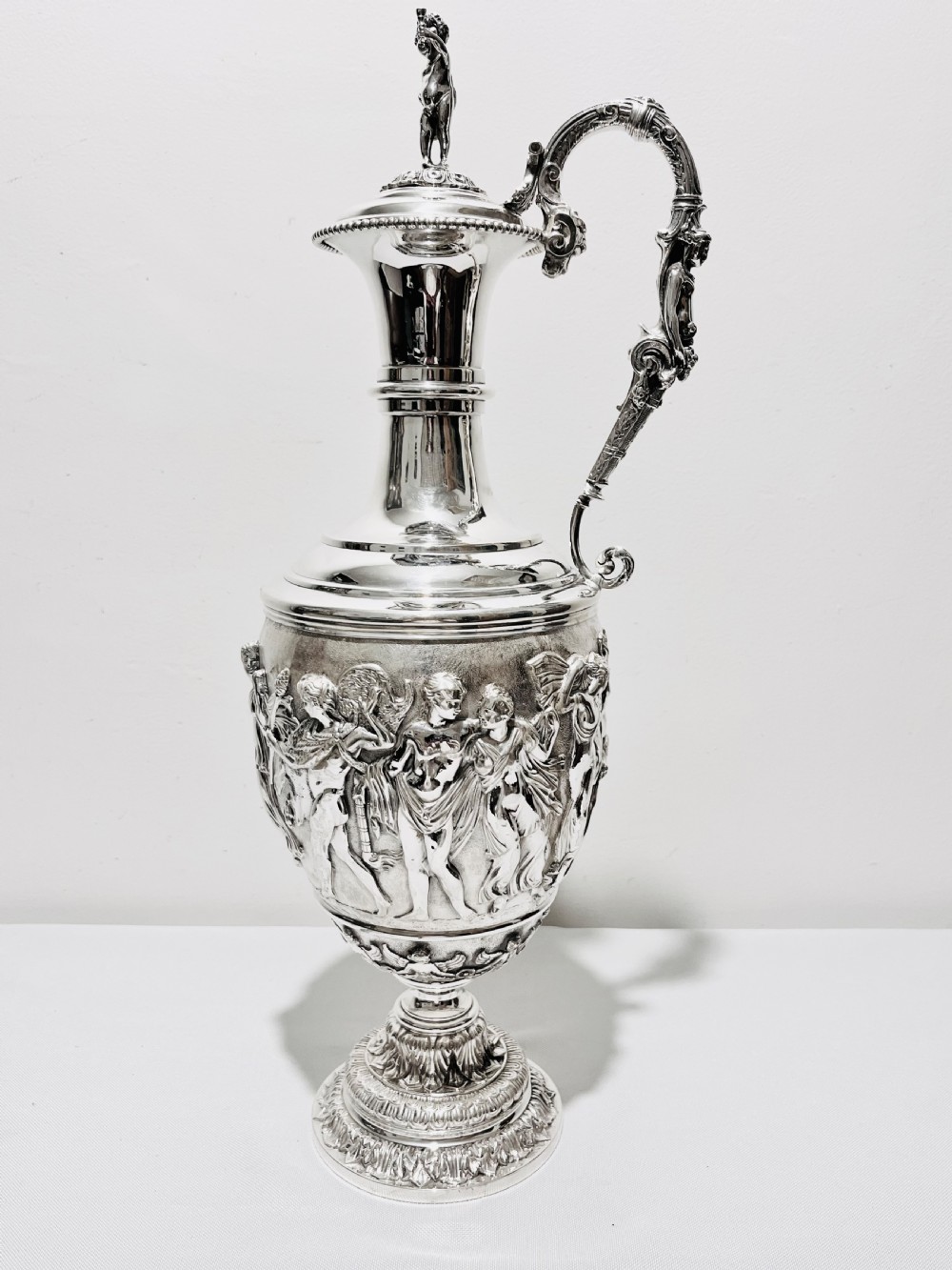 Antique silver plated tall claret  jug with relief work c1880