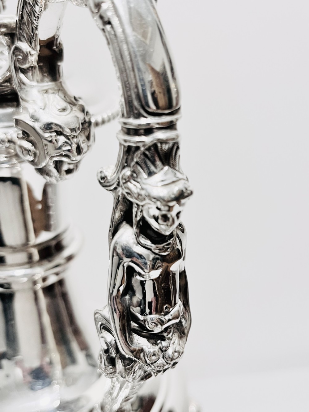 Antique silver plated tall claret  jug with relief work c1880 View III