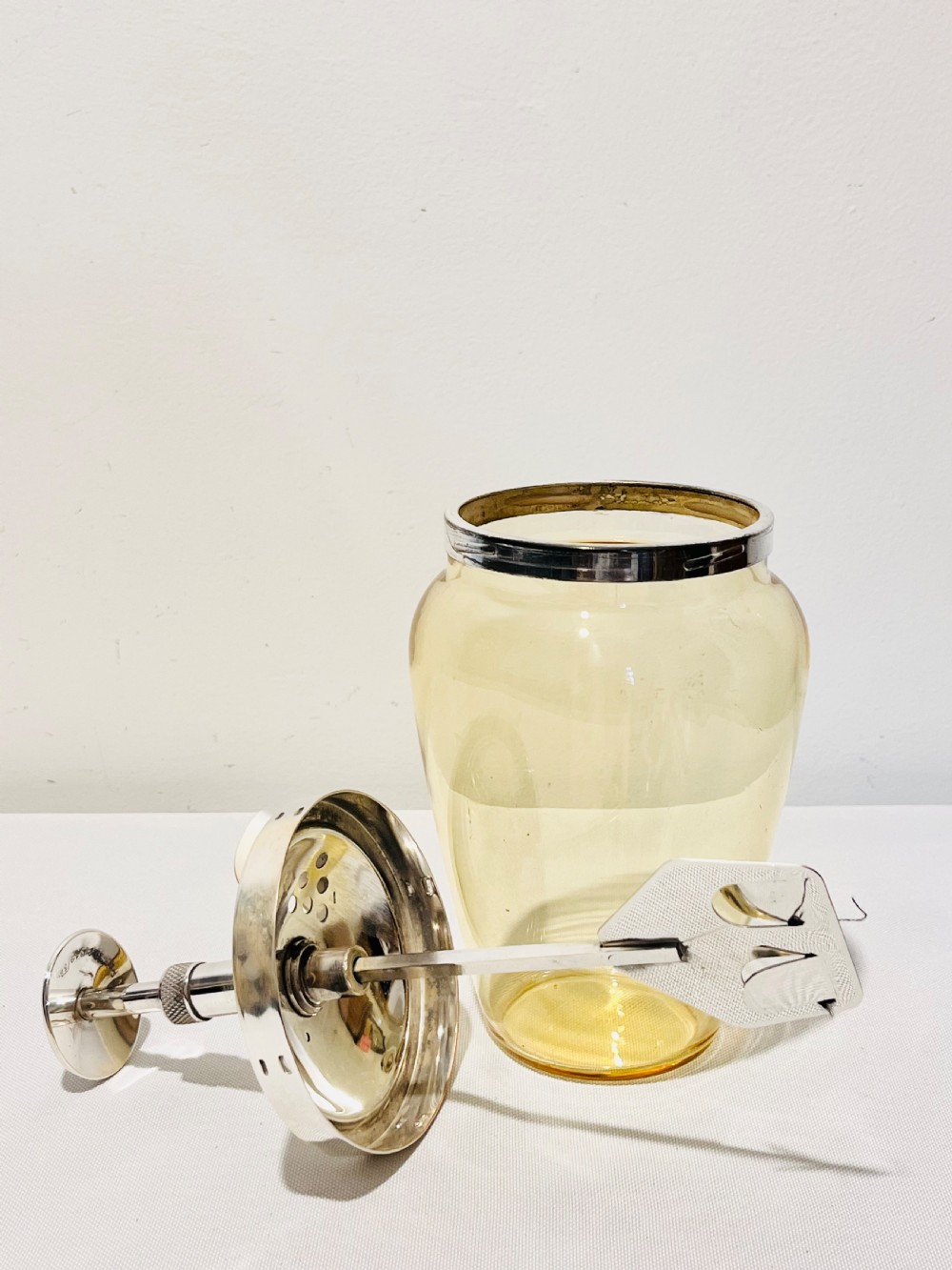 Vintage  pump action cocktail mixer c1930 glass is unusual in that it’s yellow View II