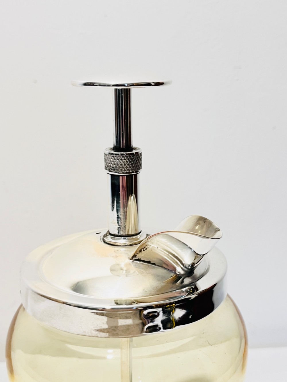 Vintage  pump action cocktail mixer c1930 glass is unusual in that it’s yellow View IV