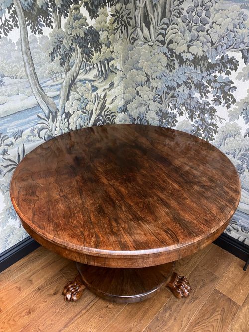 19th Century lions feet tip-top table 