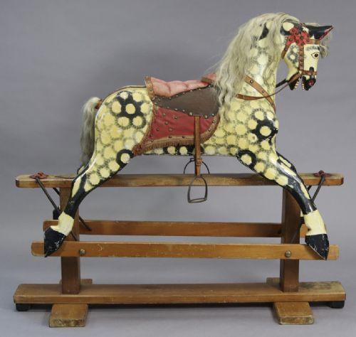 A Large Dapple Grey Painted Carved Wooden Rocking Horse on a Pine Trestle Base by Collinson & Sons Liverpool