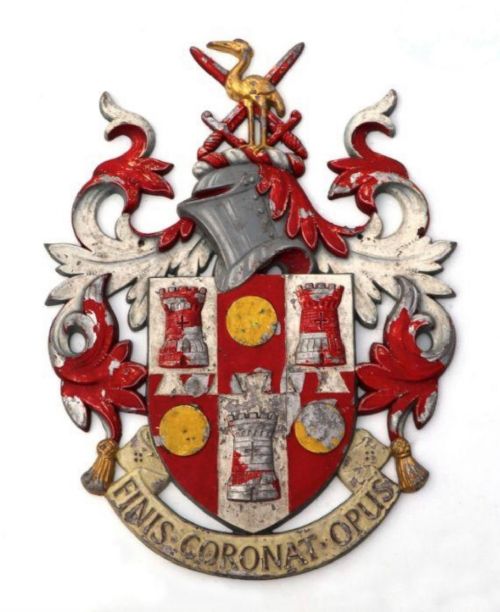 A Painted Cast Metal Heraldic Plaque