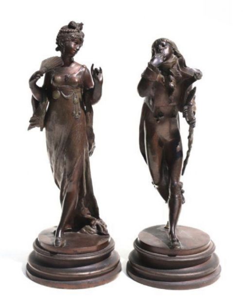 A Pair of French Bronzed Spelter Figures of a Dandy and His Beau