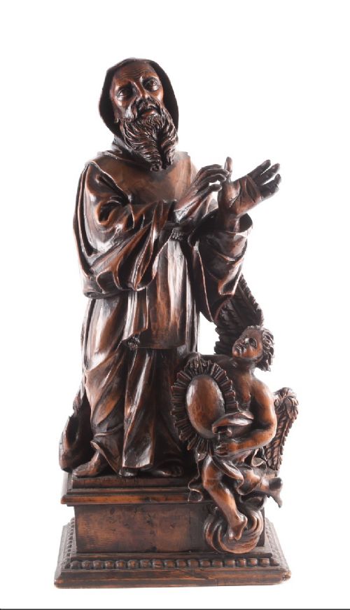 C18TH CARVED WOODEN FIGURE OF A SAINT WITH CHERUB AT HIS FEET