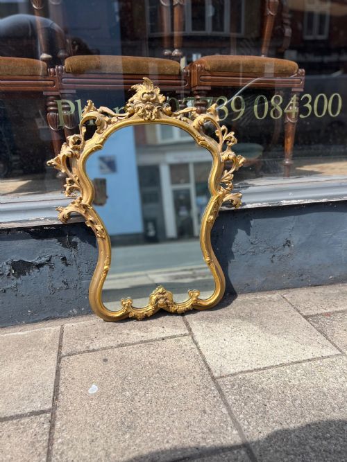 A GILDED ROCOCO STYLE WALL MIRROR - ADDITIONAL PHOTO 2