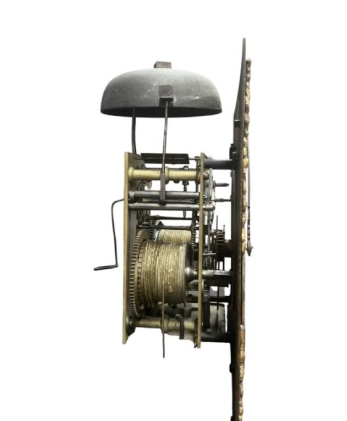 fig 1. An antique green lacquered longcase clock decorated with gold chinoiserie motifs, a brass dial, and three upper finials.