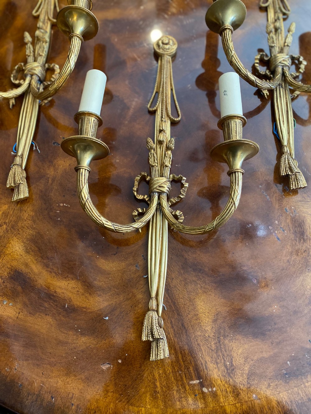 Set of three classical style gilt brass wall lights  View III