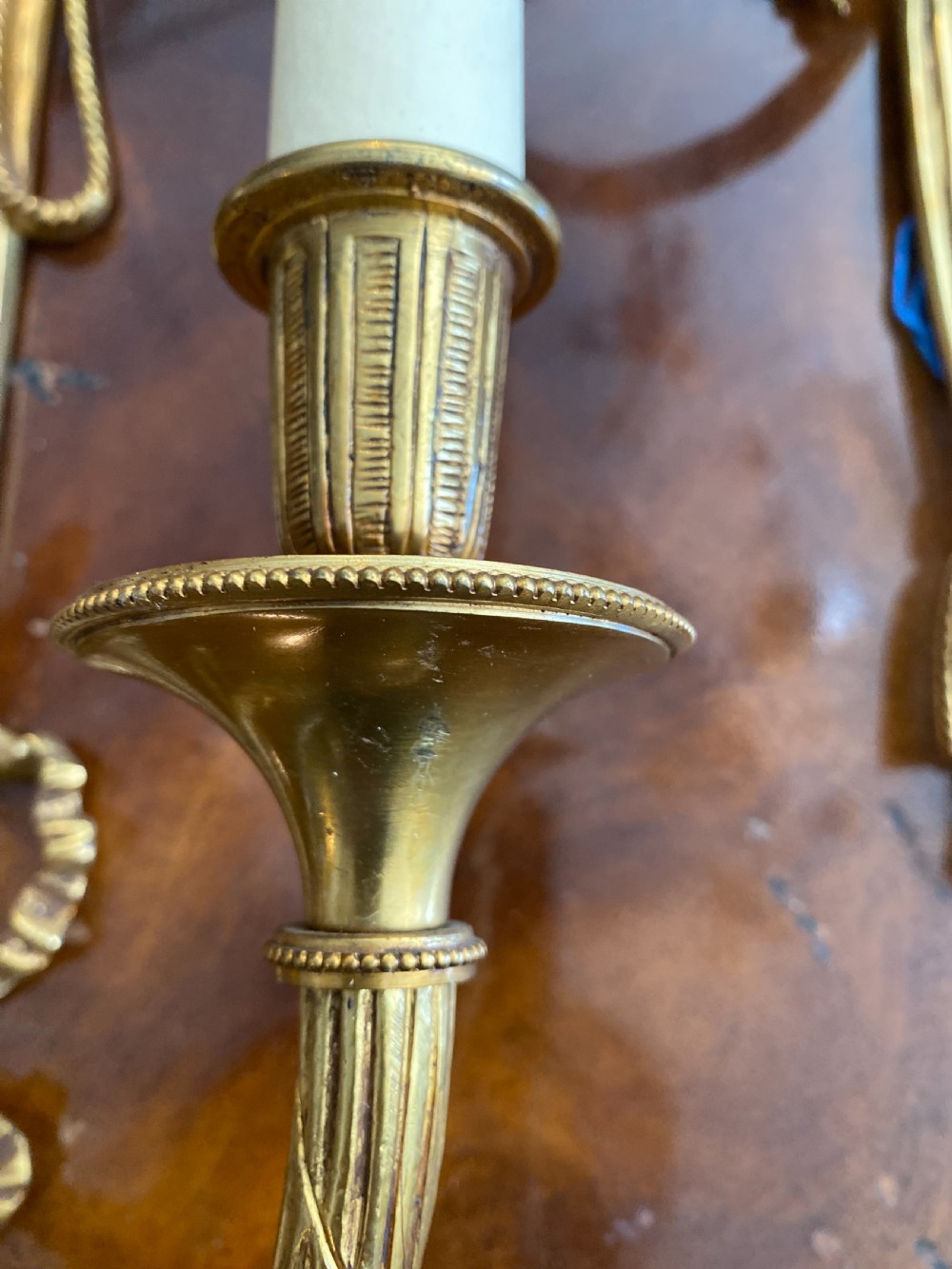 Set of three classical style gilt brass wall lights  View V