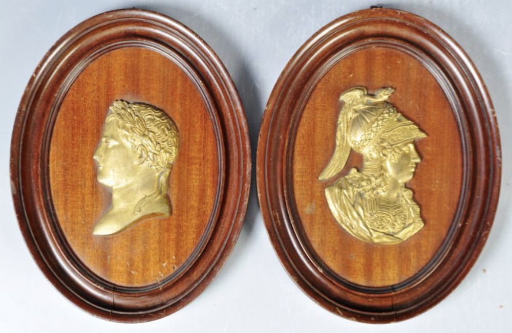 A pair of early C19th gilt bronze plaques of napoleon and Alexander the great