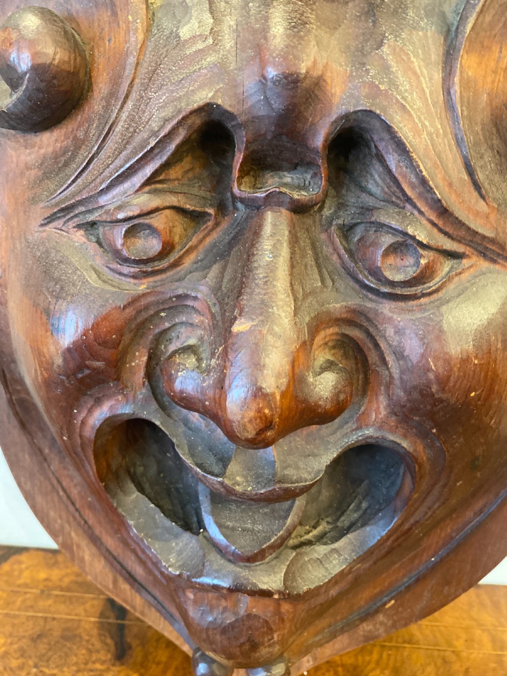 Wall mounted grotesque carved head of large size  View II