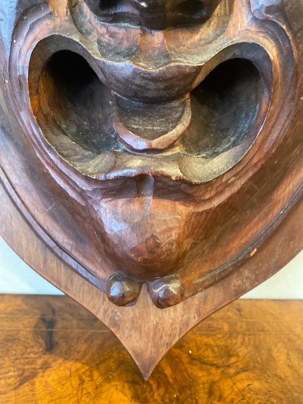Wall mounted grotesque carved head of large size  View III