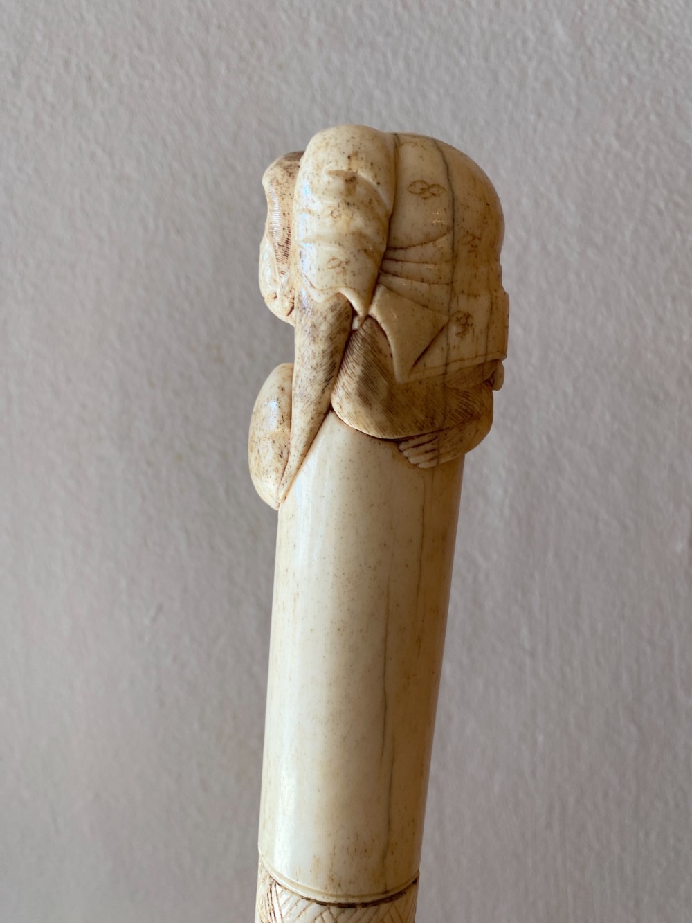 C19th Chinese bone walking stick with carved monkey holding a ball  View III