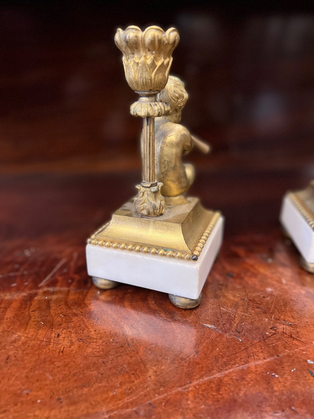 Pair of bronze ormolu cherub candlesticks  View III