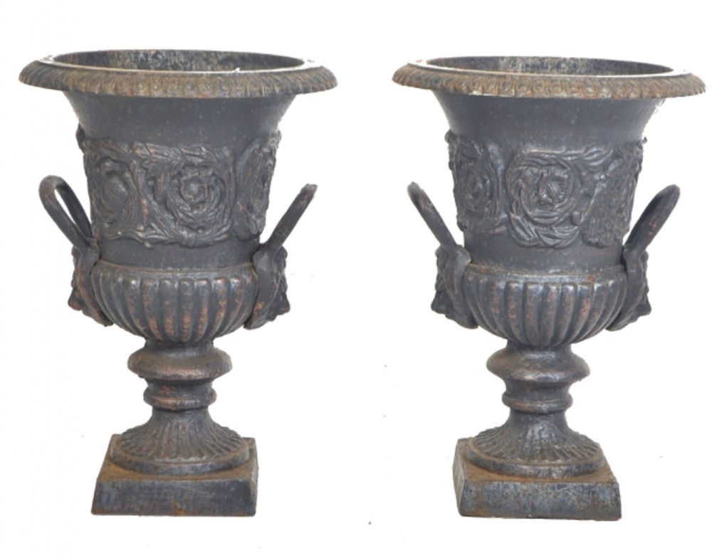 Pair of cast iron urns 