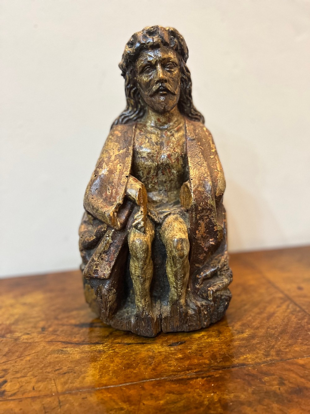 C1450 carved wood polychrome painted Christ sat on the cold stone  View II