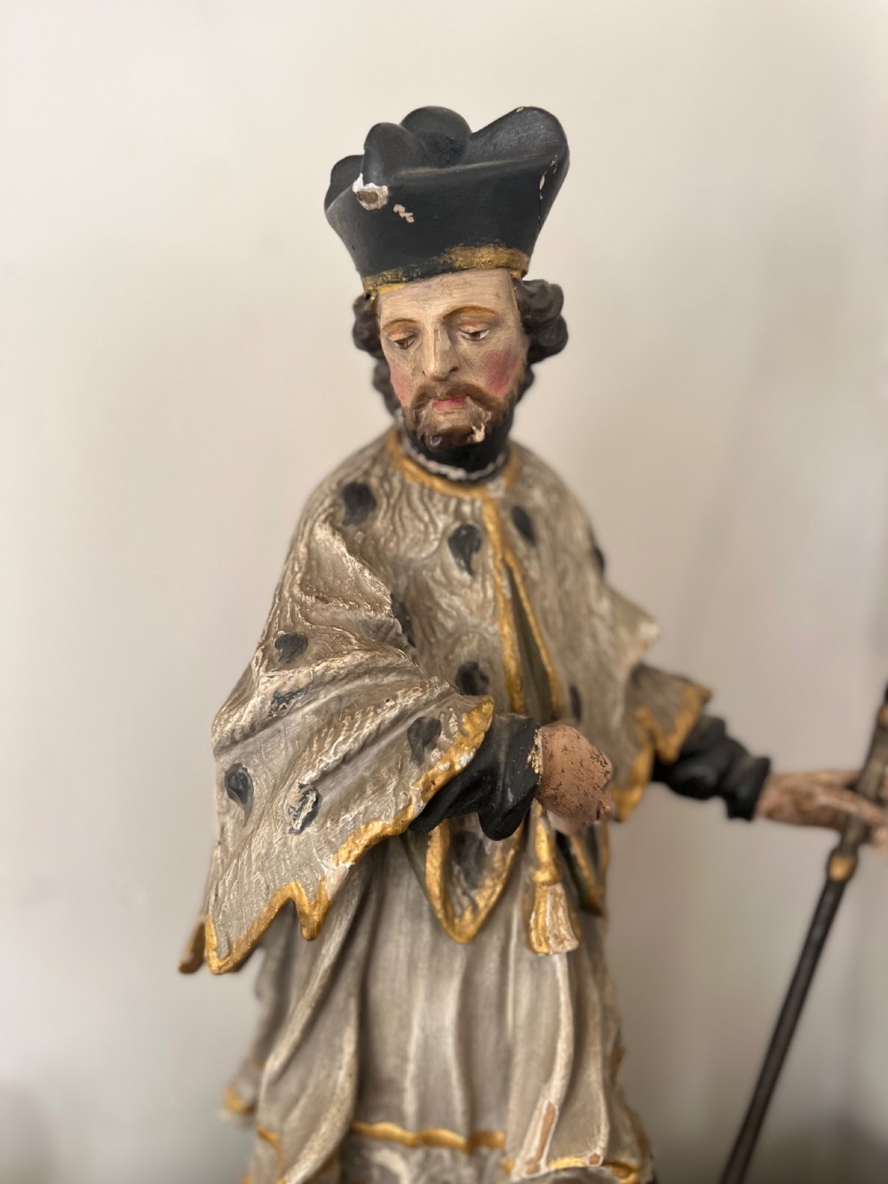 An 18th-century German carved polychrome wood figure depicting Saint John Nepomuk holding a crosier. View II