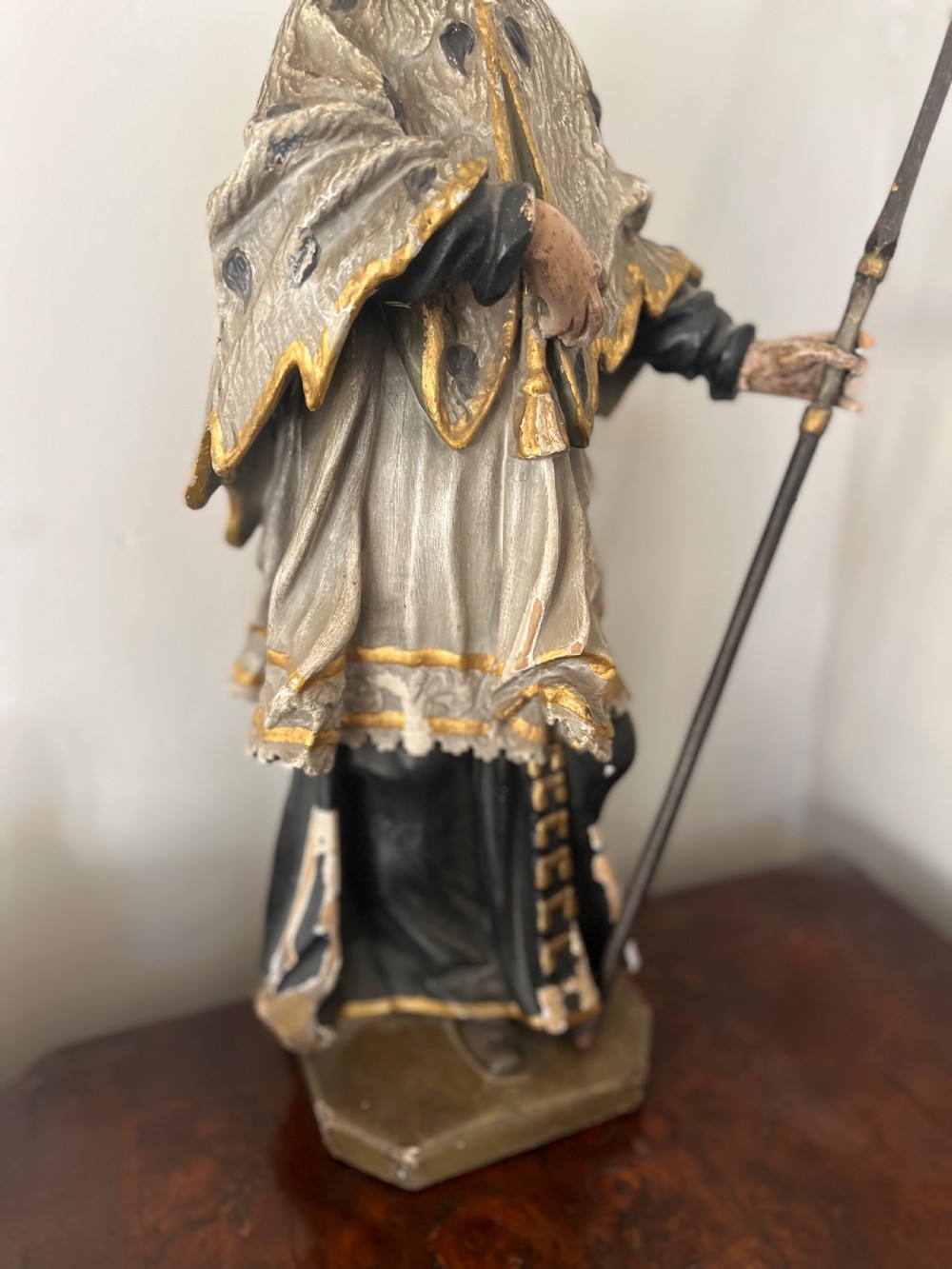 An 18th-century German carved polychrome wood figure depicting Saint John Nepomuk holding a crosier. View III