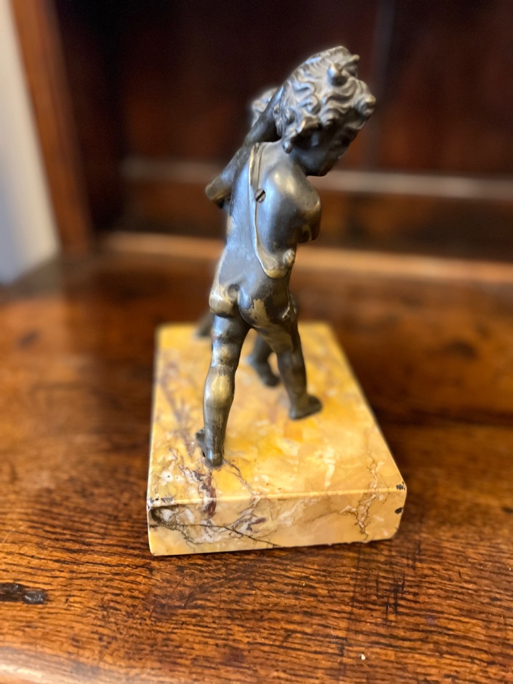 Bronze group of fighting cherubs on sienna marble base  View IV