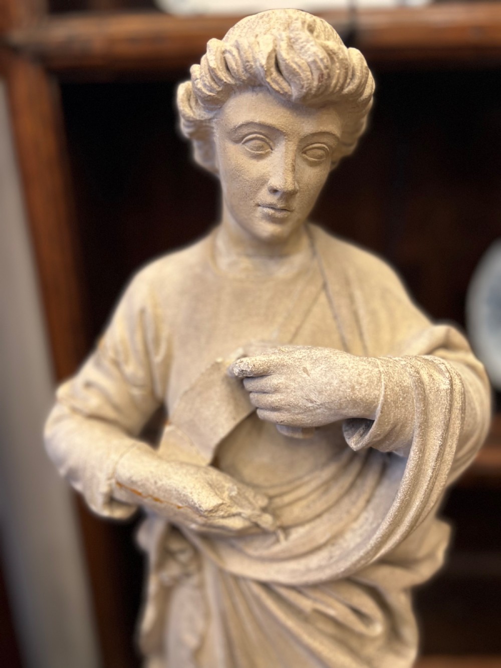 A large C19th limestone carving of St Paul  View III