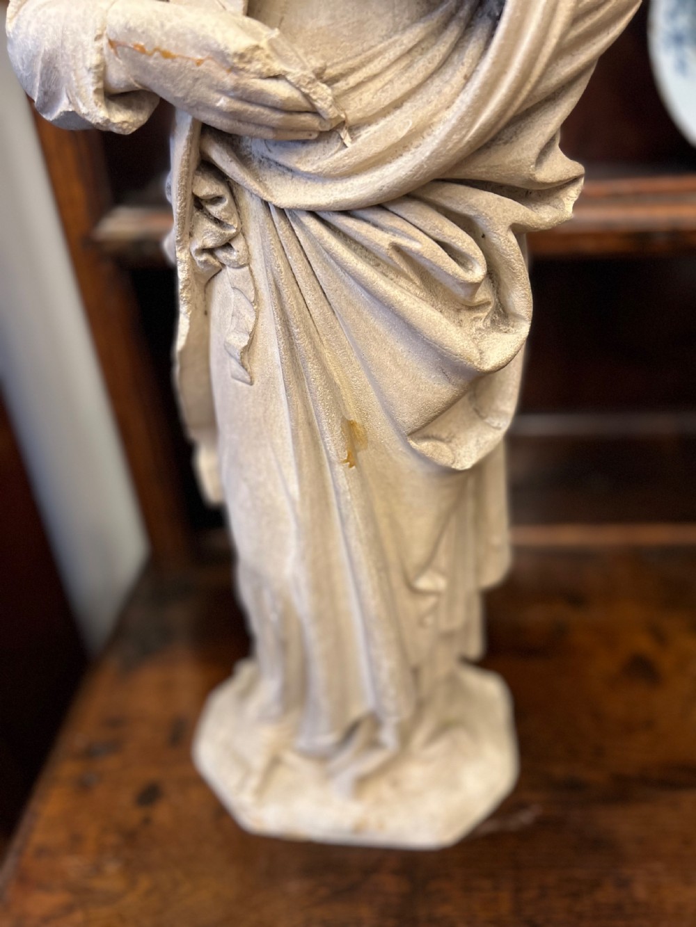 A large C19th limestone carving of St Paul  View V