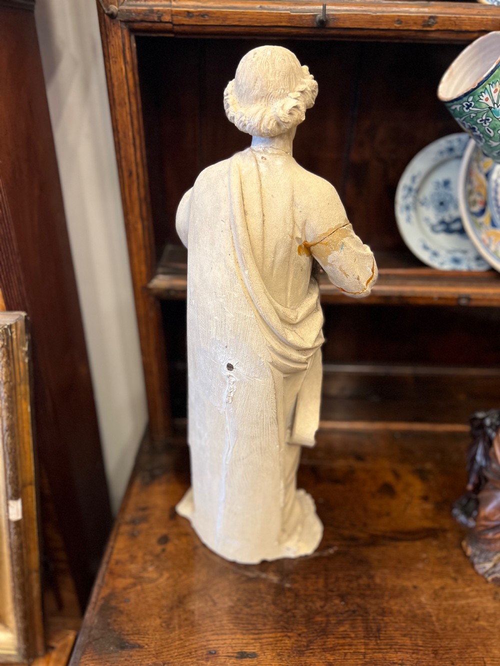 A large C19th limestone carving of St Paul  View VI